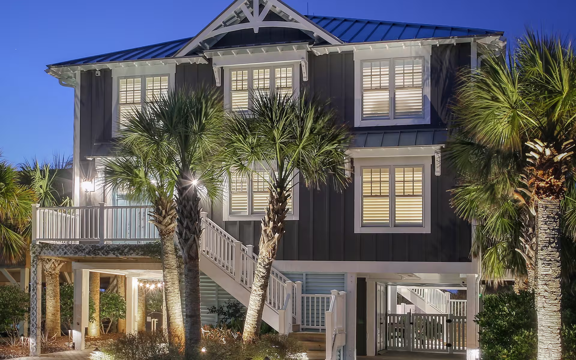 Coastal home exterior at twilight